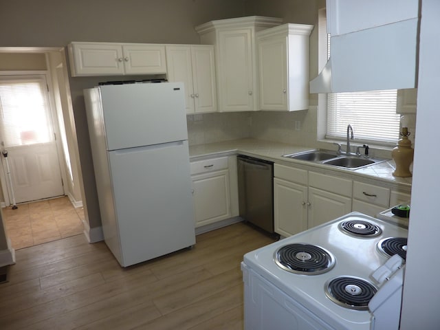 201 N Warren Ave, Columbus, OH 43204 - kitchen featuring white cabinetry, tile countertops, a sink, and white appliances