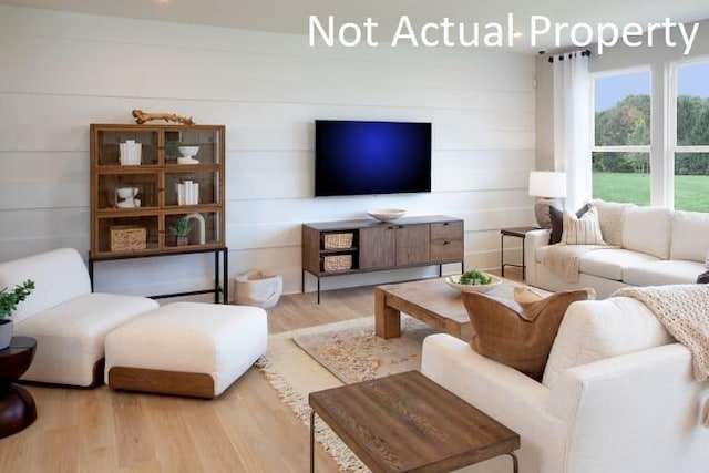 living room with wood finished floors