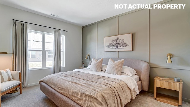bedroom featuring carpet, baseboards, and visible vents