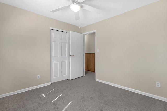 3935 Hillman Rd W, Columbus, OH 43207 - unfurnished bedroom featuring baseboards, ceiling fan, and carpet