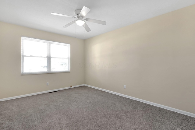 3935 Hillman Rd W, Columbus, OH 43207 - unfurnished room featuring baseboards, visible vents, and carpet floors