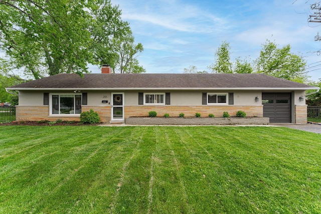 2101 Eastcleft Dr, Upper Arlington, OH 43221 - ranch-style home featuring brick siding, fence, and a garage