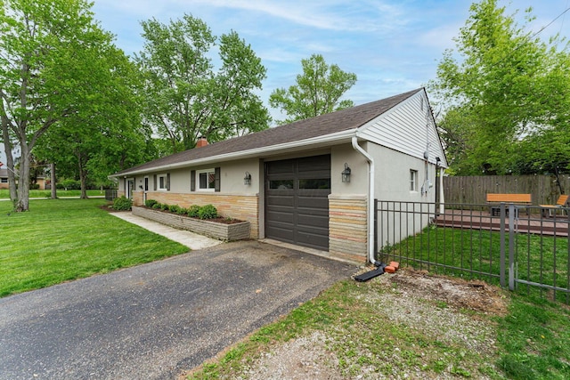 2101 Eastcleft Dr, Upper Arlington, OH 43221 - view of front of property with an attached garage, fence, a chimney, aphalt driveway, and a front yard