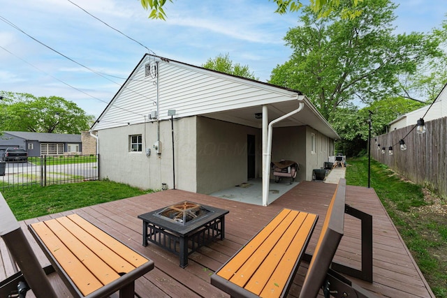2101 Eastcleft Dr, Upper Arlington, OH 43221 - deck featuring a yard, an outdoor fire pit, and fence