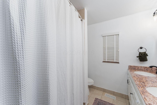 2101 Eastcleft Dr, Upper Arlington, OH 43221 - full bathroom featuring a sink, toilet, visible vents, and tile patterned floors