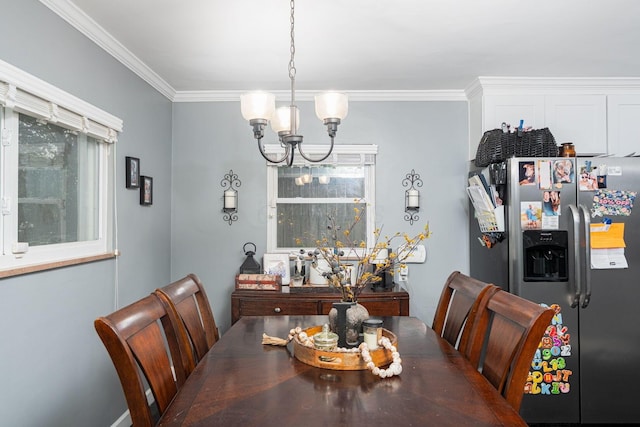 2101 Eastcleft Dr, Upper Arlington, OH 43221 - dining space featuring ornamental molding and a notable chandelier