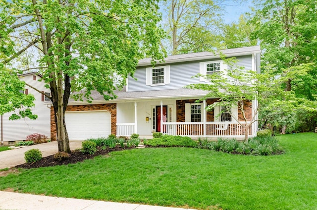 traditional home with driveway, a porch, roof with shingles, and a front lawn