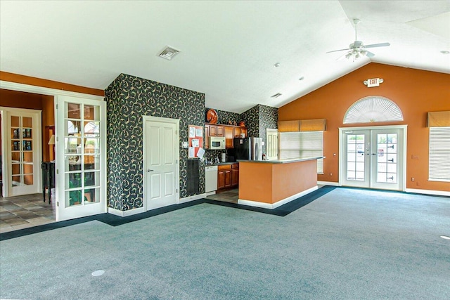 6227 Stonewalk Ln, New Albany, OH 43054 - kitchen featuring white appliances, french doors, visible vents, dark colored carpet, and wallpapered walls