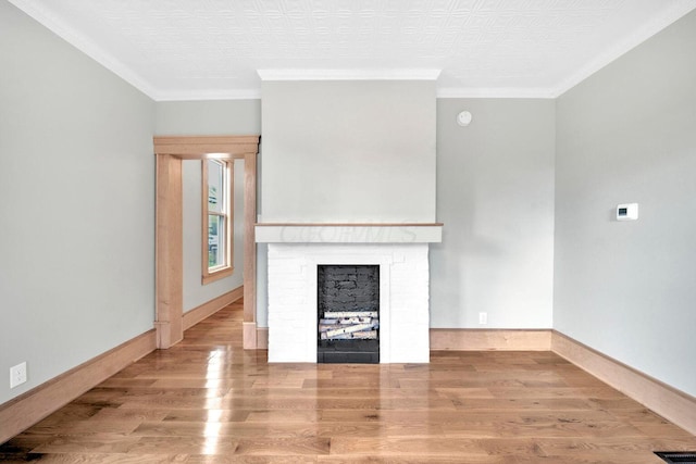 661-663 Beech St, Columbus, OH 43206 - unfurnished living room with wood finished floors, a fireplace, ornamental molding, and baseboards
