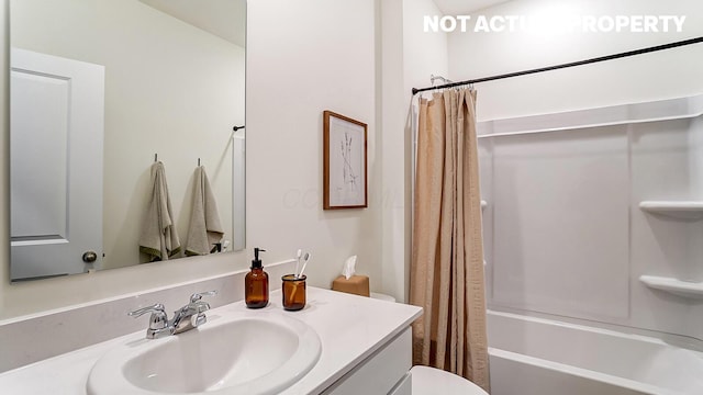 full bath featuring shower / bath combination with curtain, toilet, and vanity