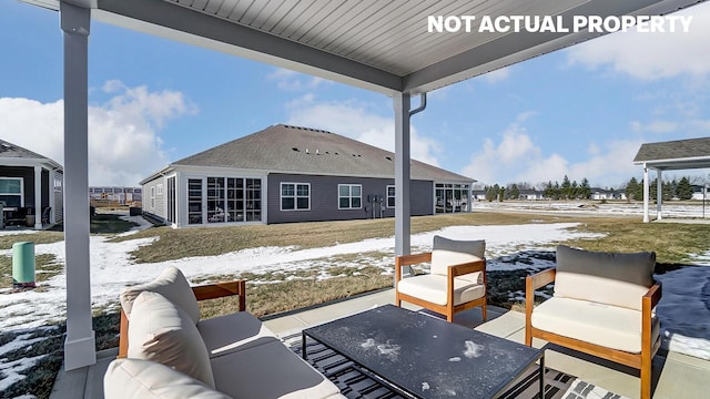 view of snow covered patio