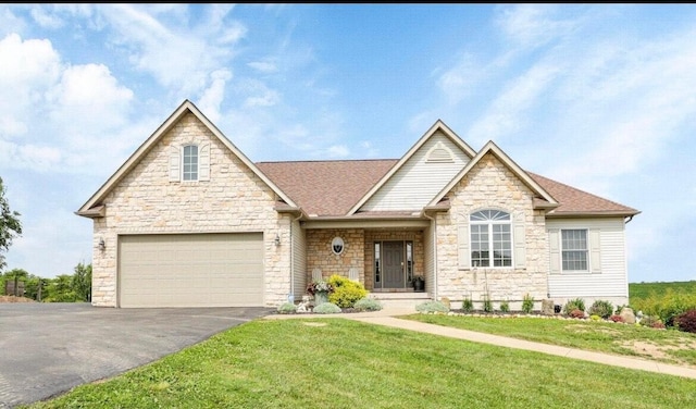 view of front facade with aphalt driveway, a garage, a front lawn, and stone siding