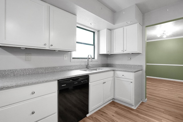 kitchen featuring a sink, white cabinetry, light wood-style floors, and dishwasher