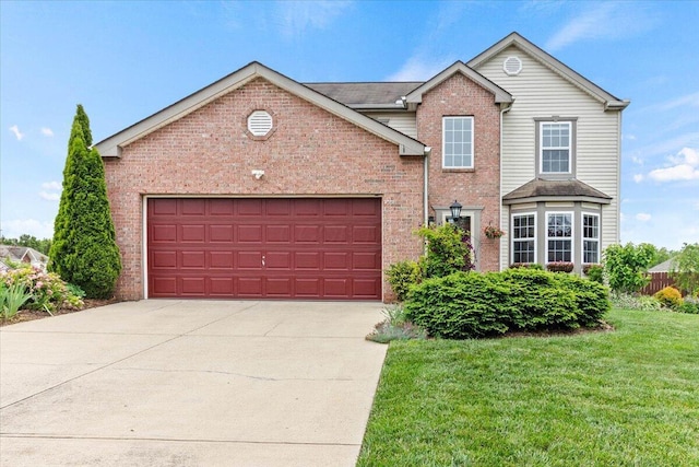 830 Avalon Dr, Pickerington, OH 43147 - traditional-style home with driveway, brick siding, an attached garage, and a front yard