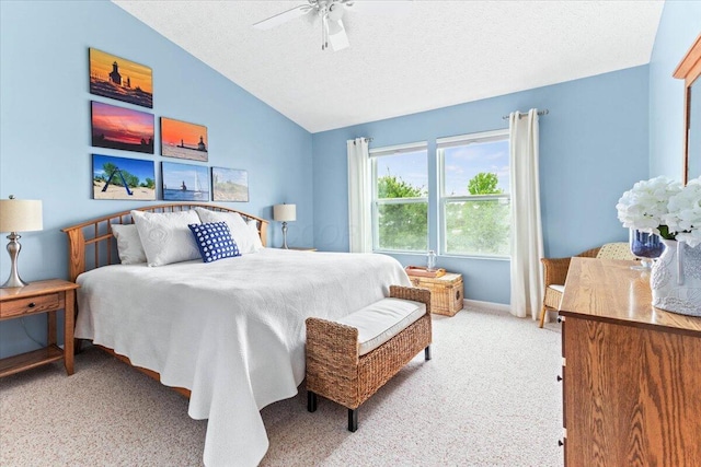 830 Avalon Dr, Pickerington, OH 43147 - carpeted bedroom featuring lofted ceiling, a textured ceiling, a ceiling fan, and baseboards