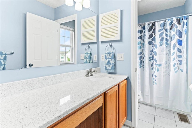 830 Avalon Dr, Pickerington, OH 43147 - bathroom featuring toilet, vanity, tile patterned flooring, and a shower with curtain