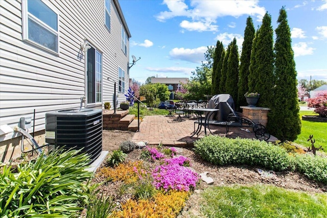 830 Avalon Dr, Pickerington, OH 43147 - view of yard featuring cooling unit and a patio area