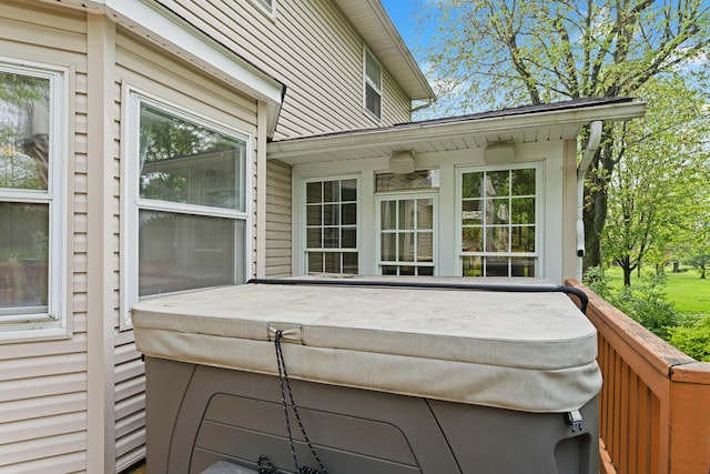 deck with a hot tub