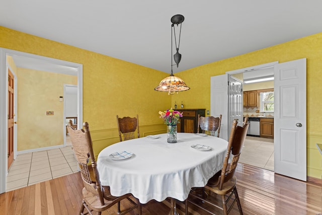dining room with light wood-style floors