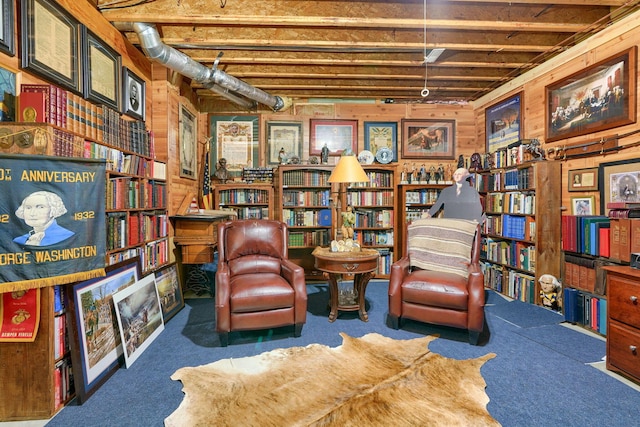 living area featuring carpet