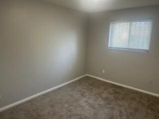 1621 Burley Dr, Columbus, OH 43207 - carpeted empty room with baseboards