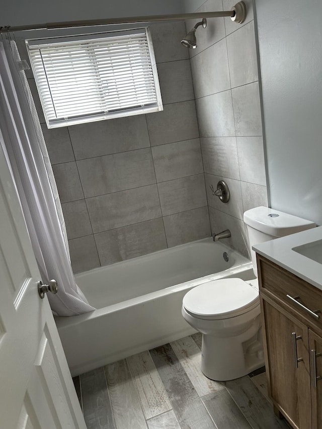 1621 Burley Dr, Columbus, OH 43207 - full bath featuring shower / bathtub combination with curtain, vanity, and toilet