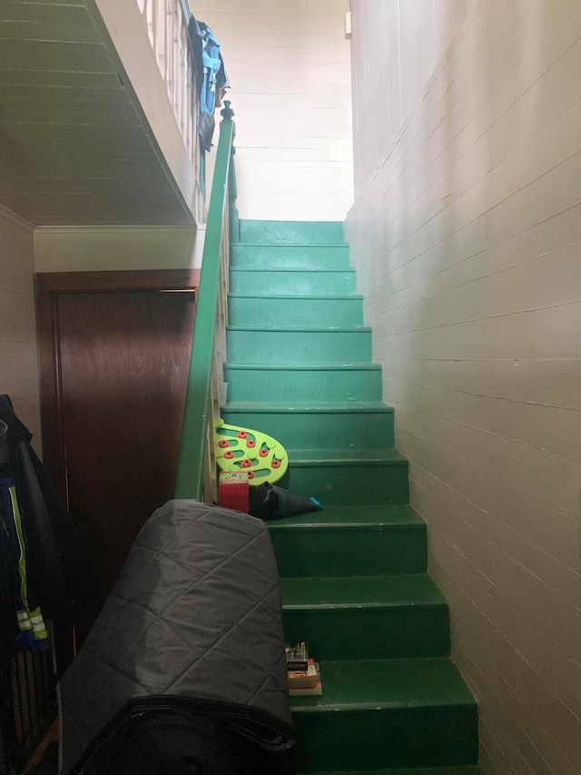 stairs with crown molding