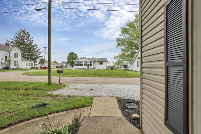 118 Maple St, Hebron, OH 43025 - view of grassy yard featuring a residential view