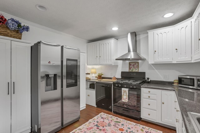 118 Maple St, Hebron, OH 43025 - kitchen featuring black appliances, wall chimney exhaust hood, white cabinetry, dark wood-style flooring, and dark countertops