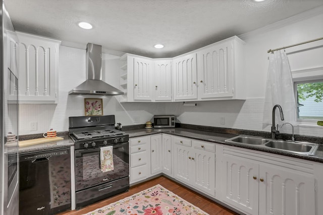 118 Maple St, Hebron, OH 43025 - kitchen with black appliances, wall chimney range hood, a sink, backsplash, and a textured ceiling