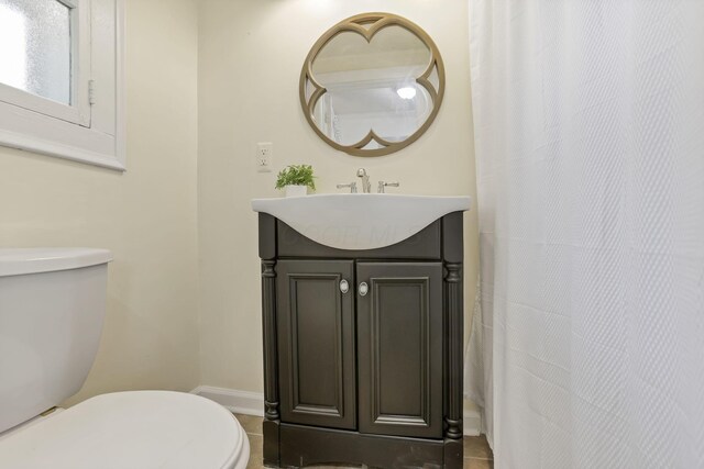118 Maple St, Hebron, OH 43025 - full bath featuring toilet, vanity, tile patterned flooring, and baseboards