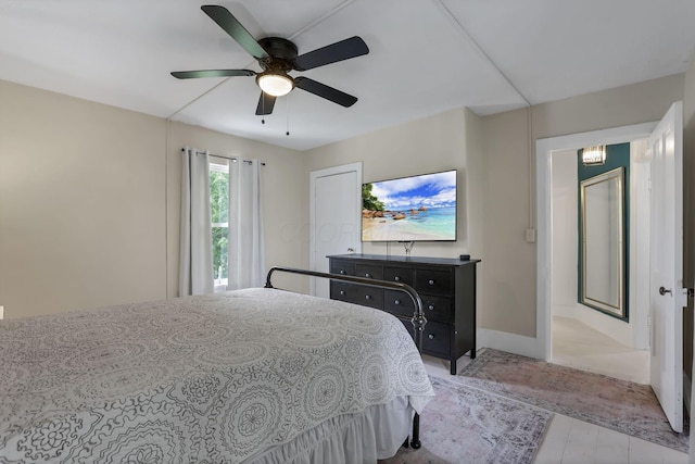 118 Maple St, Hebron, OH 43025 - bedroom with baseboards, a ceiling fan, and light wood-style flooring