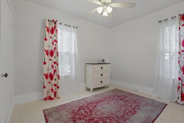 118 Maple St, Hebron, OH 43025 - bedroom with baseboards, a ceiling fan, and tile patterned floors