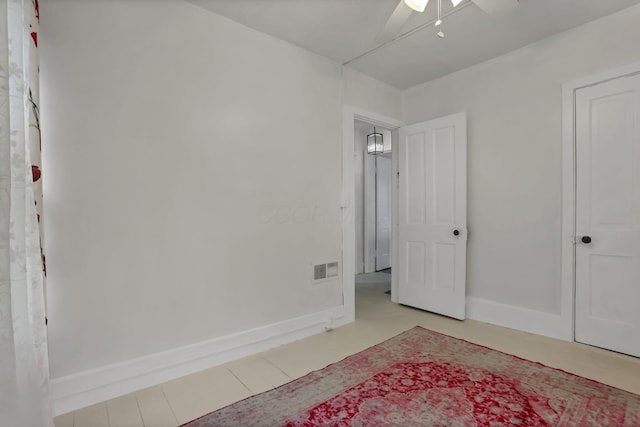 118 Maple St, Hebron, OH 43025 - unfurnished bedroom featuring baseboards and ceiling fan