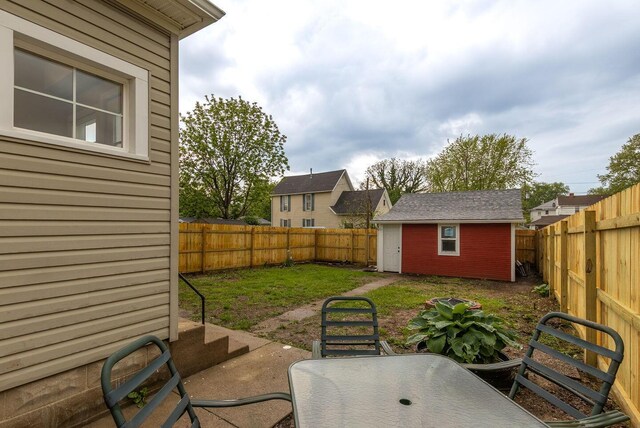 730 Forest Rose Ave, Lancaster, OH 43130 - view of patio / terrace with outdoor dining space, an outbuilding, and a shed