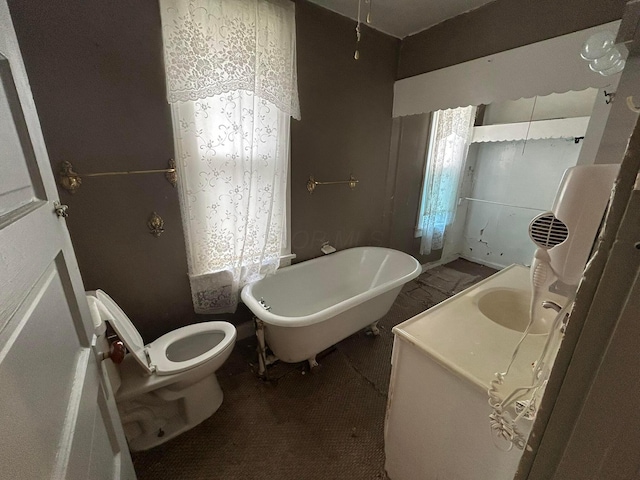 1218 W Mulberry St, Lancaster, OH 43130 - full bathroom featuring a freestanding bath, toilet, and vanity