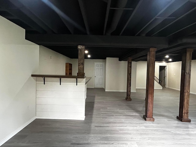 12601 Vincent Rd, Mount Vernon, OH 43050 - finished below grade area featuring wood finished floors, baseboards, and stairs