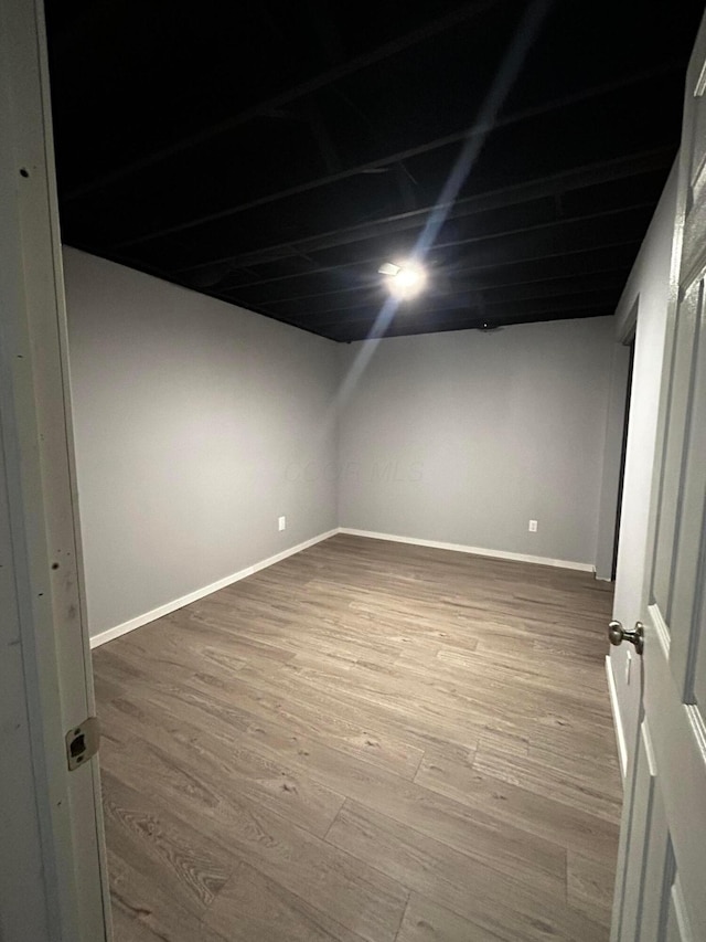 12601 Vincent Rd, Mount Vernon, OH 43050 - finished below grade area featuring wood finished floors and baseboards