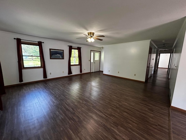 12601 Vincent Rd, Mount Vernon, OH 43050 - unfurnished living room with a ceiling fan, dark wood-type flooring, ornamental molding, and baseboards