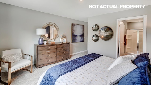 bedroom with baseboards and carpet floors