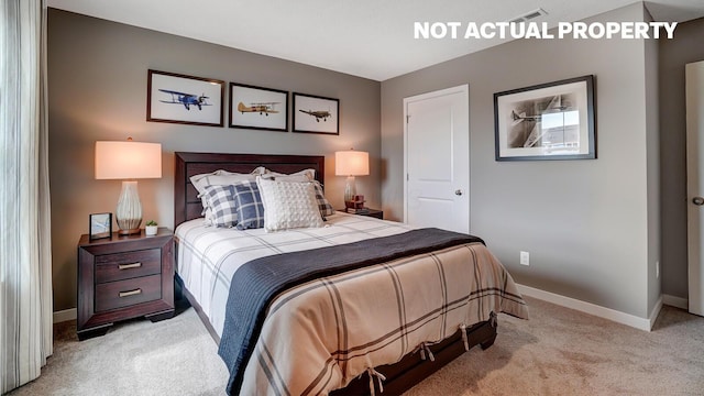 bedroom featuring carpet flooring, visible vents, and baseboards