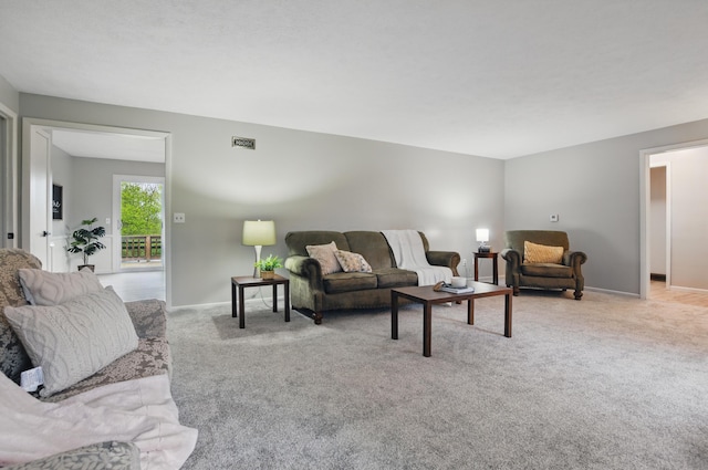1899 S Main St, Mansfield, OH 44904 - living area featuring baseboards, visible vents, and carpet