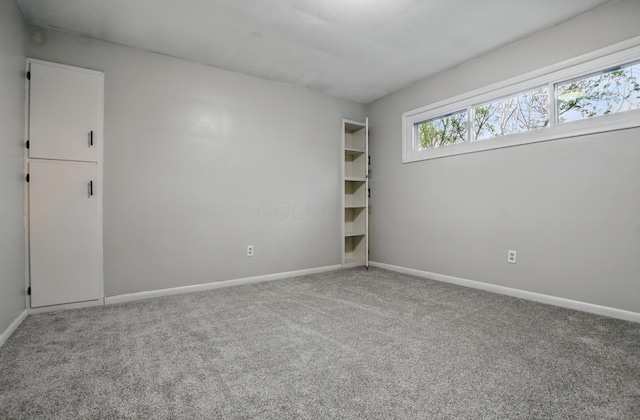 1899 S Main St, Mansfield, OH 44904 - spare room featuring carpet and baseboards