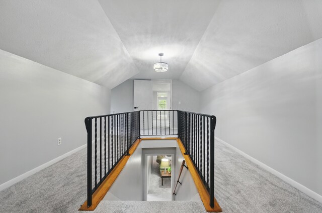 1899 S Main St, Mansfield, OH 44904 - staircase featuring lofted ceiling, carpet, and baseboards
