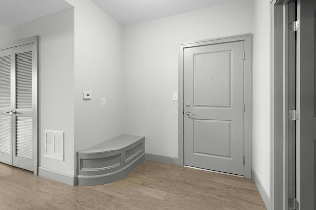 51 N High St Unit 408, Columbus, OH 43215 - mudroom featuring wood finished floors and baseboards