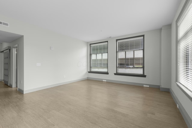 51 N High St Unit 408, Columbus, OH 43215 - spare room with light wood-type flooring and baseboards