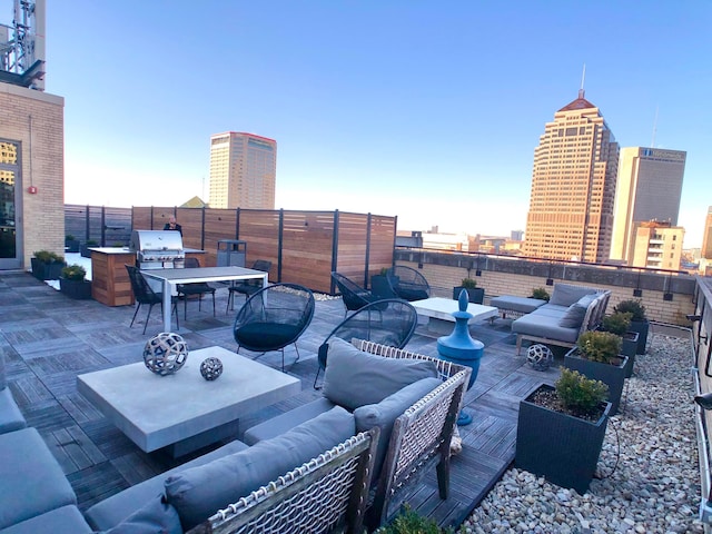 51 N High St Unit 408, Columbus, OH 43215 - view of patio with an outdoor hangout area, grilling area, exterior kitchen, and a city view