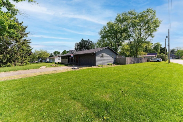 26 Garrick St, Newark, OH 43055 - view of yard featuring driveway and a garage