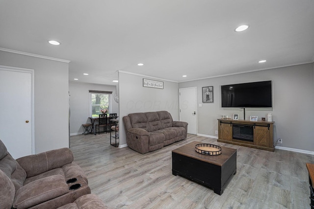 26 Garrick St, Newark, OH 43055 - living room with light wood-style flooring, recessed lighting, crown molding, and baseboards