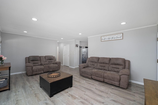 26 Garrick St, Newark, OH 43055 - living room with ornamental molding, recessed lighting, light wood-type flooring, and baseboards